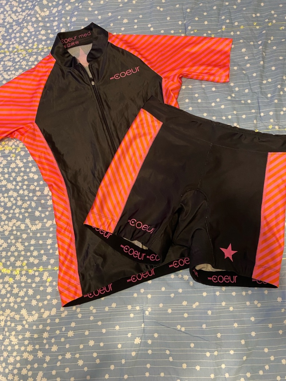Coeur athletic/cycling outfit in good condition.  Pink orange and black